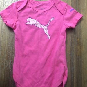 Pink puma onesie